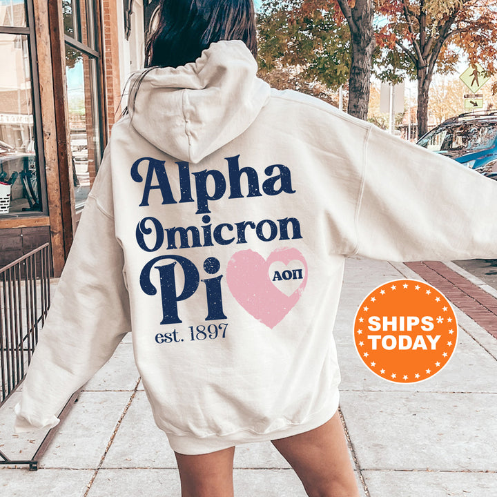 a woman in a white hoodie is walking down the street