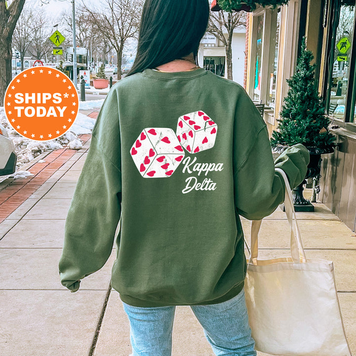 a woman walking down a sidewalk carrying a shopping bag