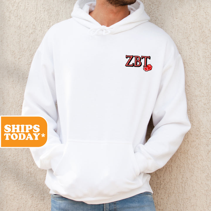 a man wearing a white hoodie with a red heart on it