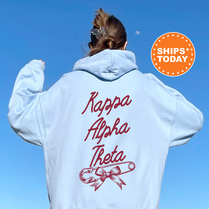 a woman with her back to the camera wearing a white hoodie