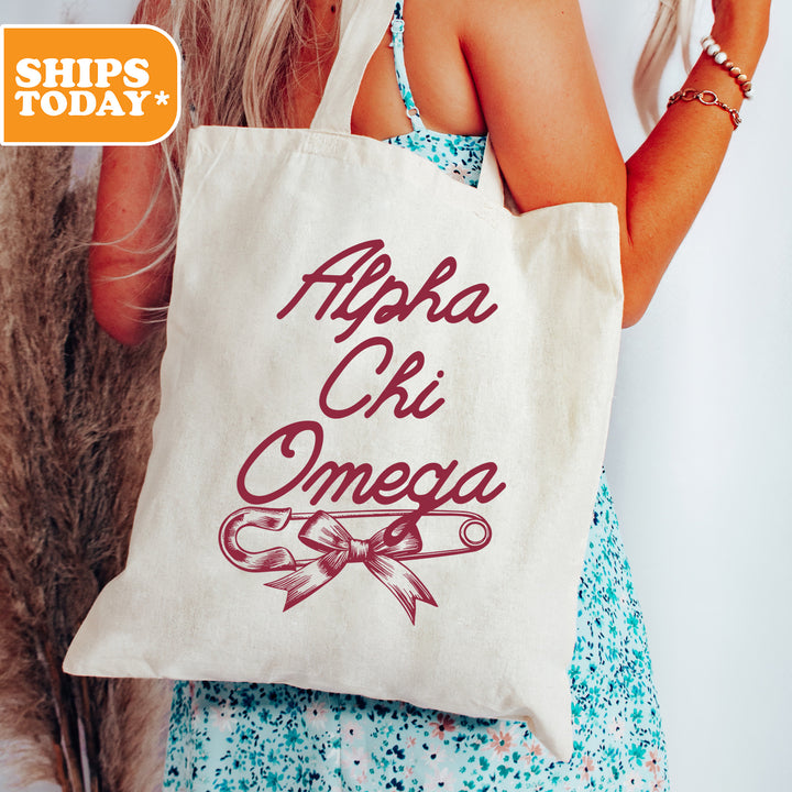 a woman holding a tote bag with a message on it