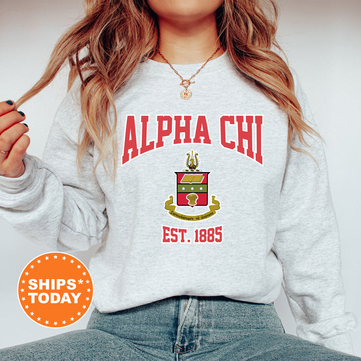 a woman wearing a sweatshirt with a crest on it