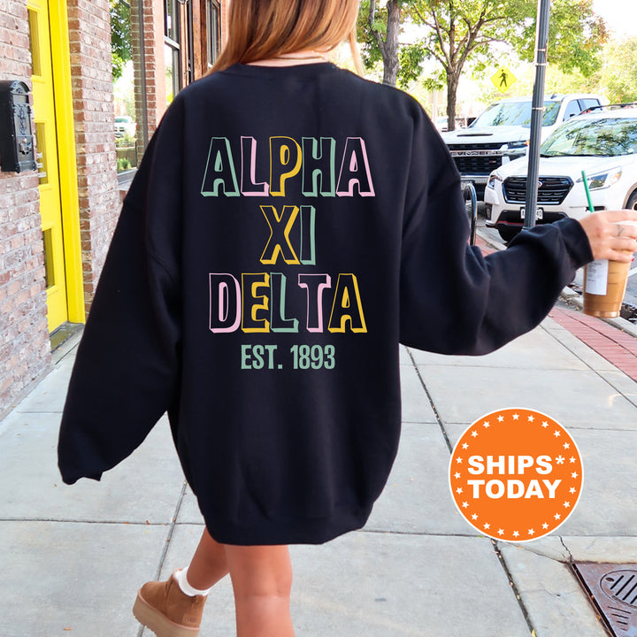 a woman walking down a sidewalk wearing a black sweatshirt