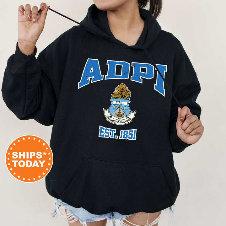 a woman wearing a black hoodie with the words adp on it