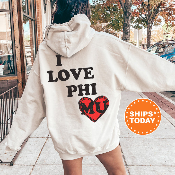 a woman in a white hoodie that says i love phi ships today