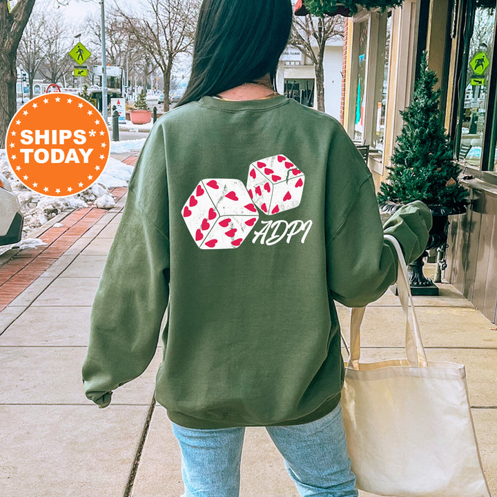 a woman walking down a sidewalk carrying a shopping bag