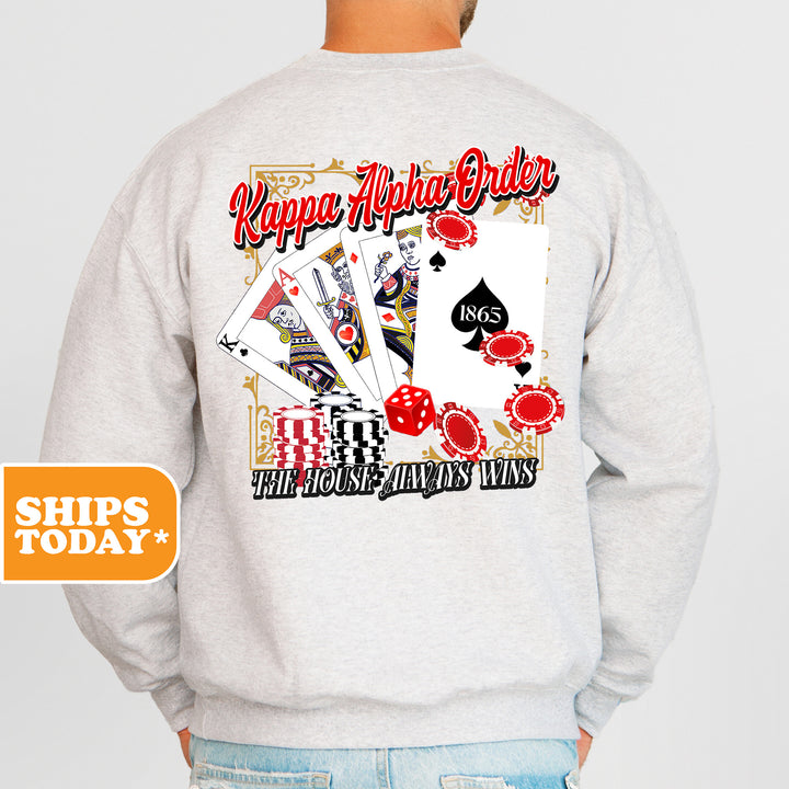 a man wearing a happy new year's card sweatshirt