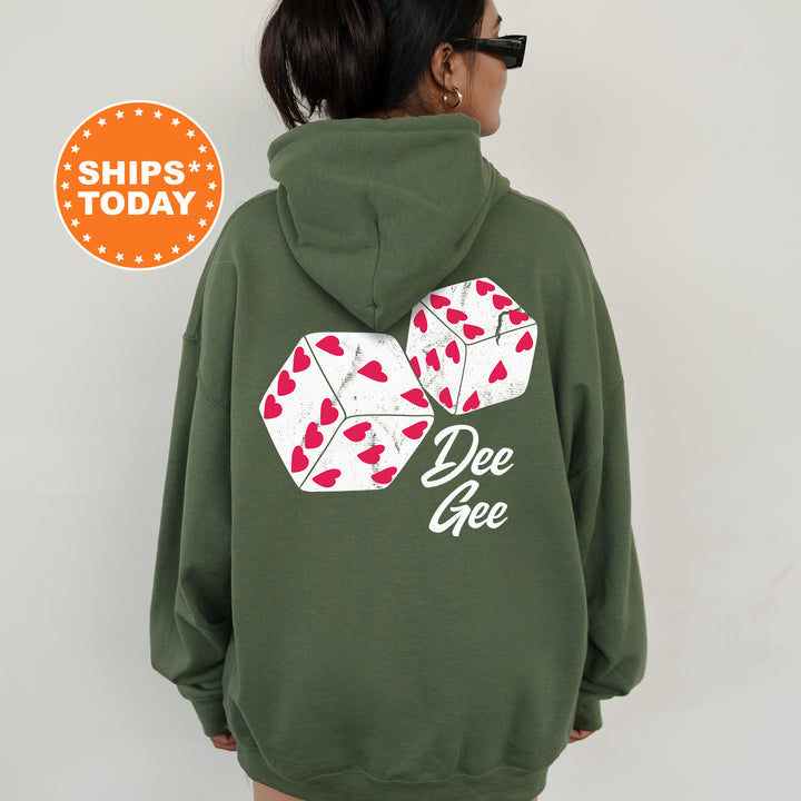 a woman wearing a green hoodie with hearts on it