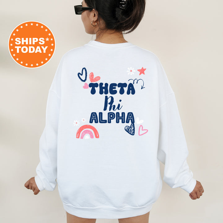 a woman wearing a sweatshirt that says, they're in the alphabet