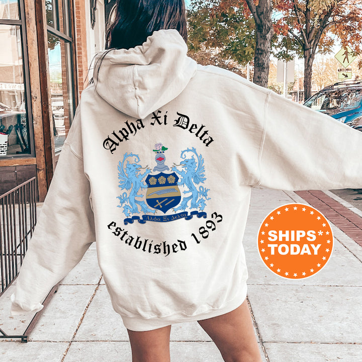 a woman walking down a sidewalk wearing a white hoodie