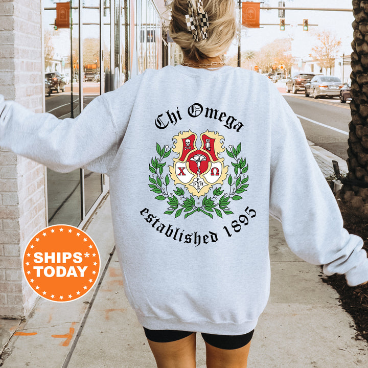 a woman walking down a sidewalk wearing a sweatshirt