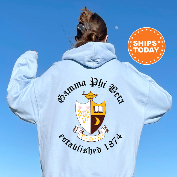 a woman with her back to the camera wearing a white hoodie