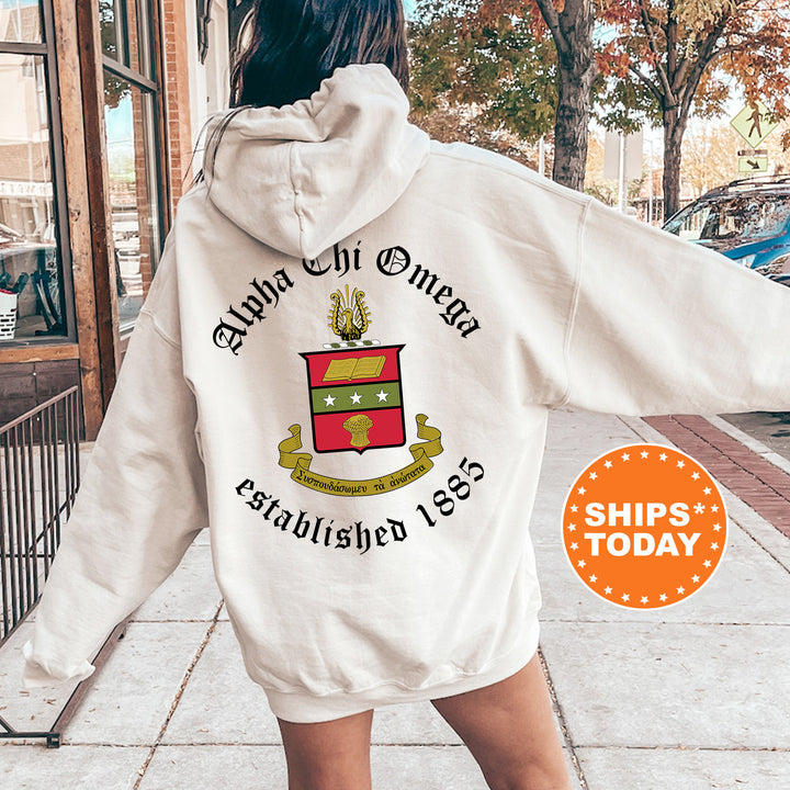 a woman walking down a sidewalk wearing a white hoodie