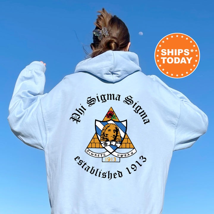 a woman wearing a white hoodie with a blue sky in the background