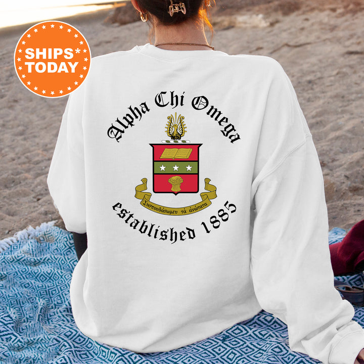 a woman sitting on a blanket on the beach