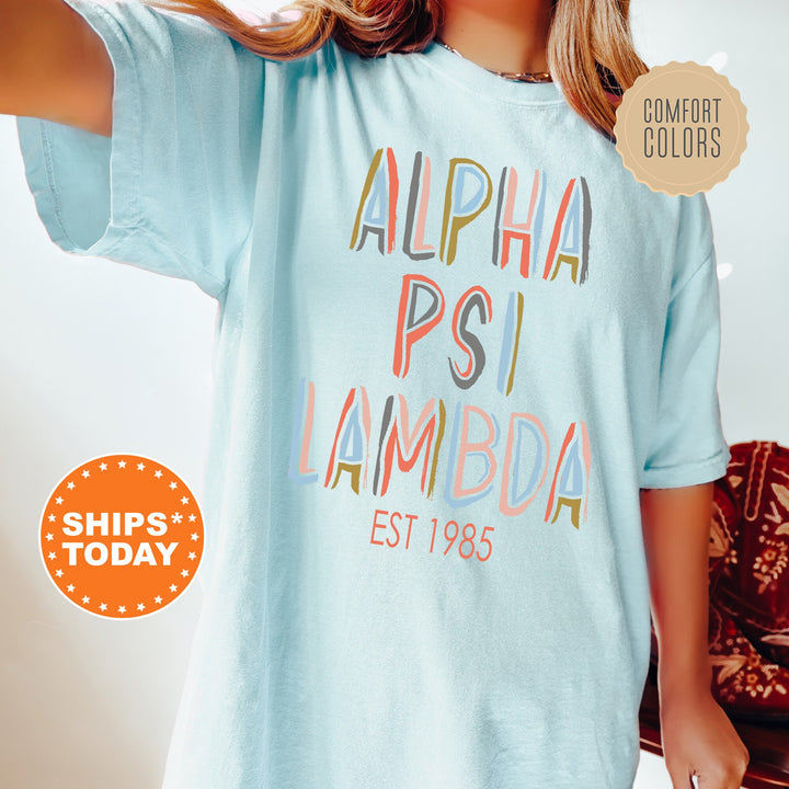 Alpha Psi Lambda Pastel Stencil Coed T-Shirt | Alpha Psi Lambda Comfort Colors Shirt | Frat Bid Day Gift | Custom Greek Apparel _ 8833g