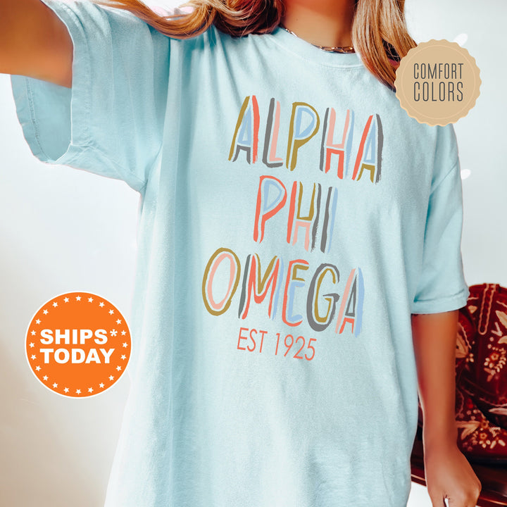 Alpha Phi Omega Pastel Stencil Coed T-Shirt | APHIO Comfort Colors Shirt | Fraternity Apparel | Bid Day Gift | Custom Greek Apparel _ 8832g