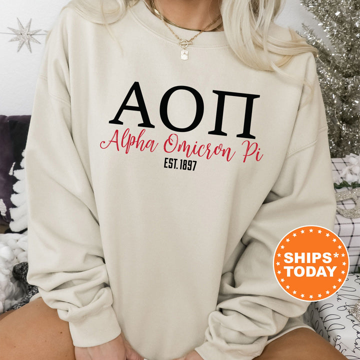 a woman sitting on a couch wearing a sweatshirt