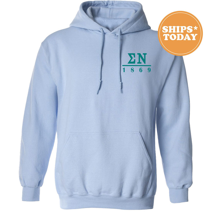 a light blue hoodie with a green logo on it
