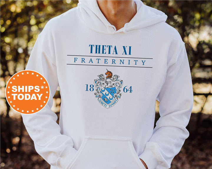 a person wearing a white hoodie with a blue crest on it