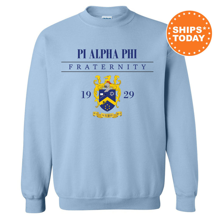 a light blue sweatshirt with a picture of a coat of arms