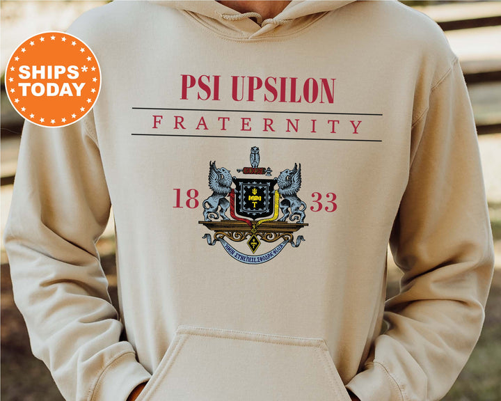 a person wearing a hoodie with a picture of a coat of arms on it