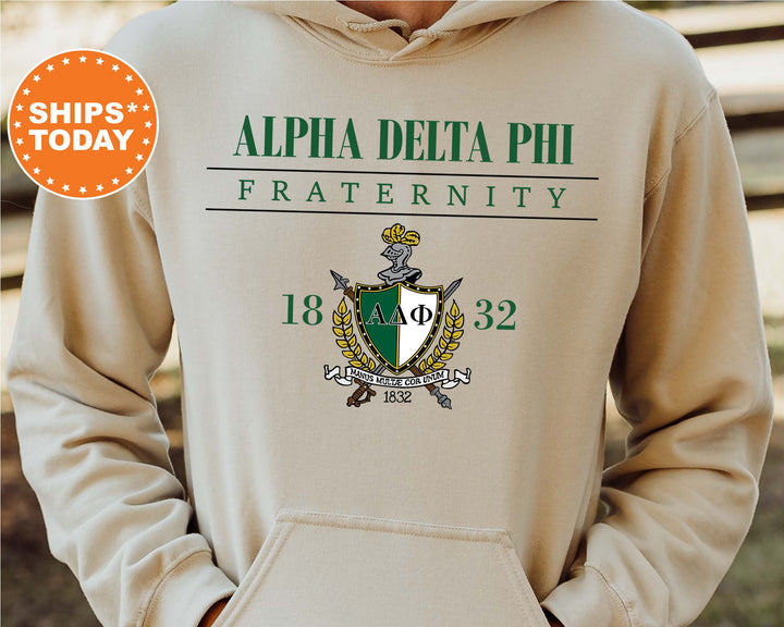 a person wearing a hoodie with a crest on it