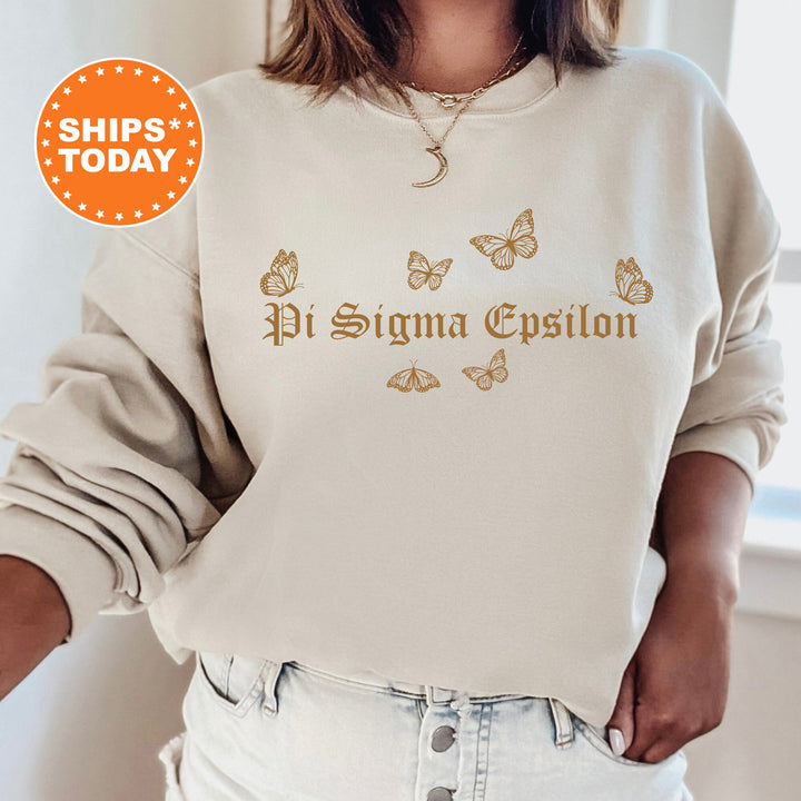 a woman wearing a sweatshirt with a butterfly design