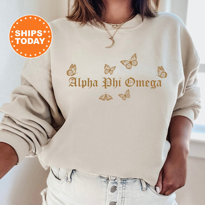 a woman wearing a sweatshirt with a butterfly design