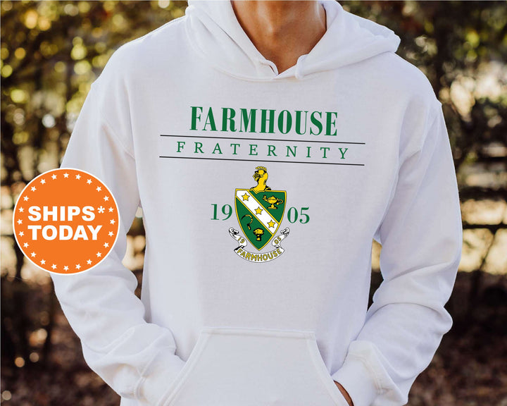 a person wearing a white hoodie with a green and white logo