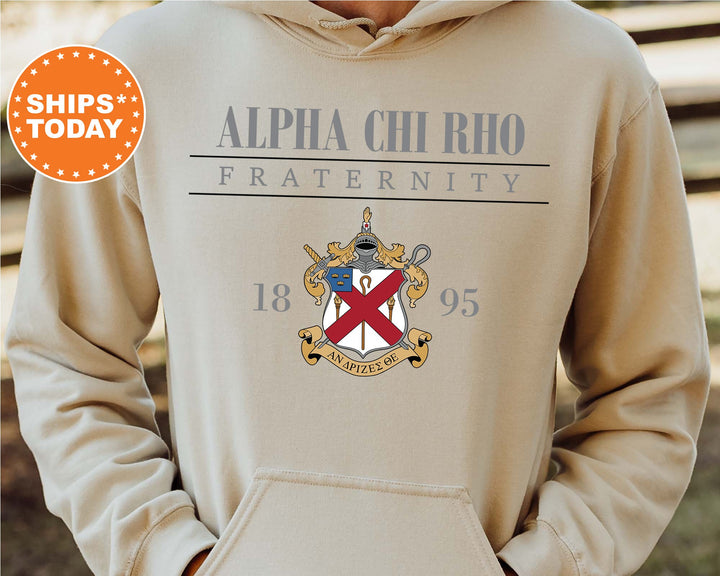 a person wearing a hoodie with a coat of arms on it