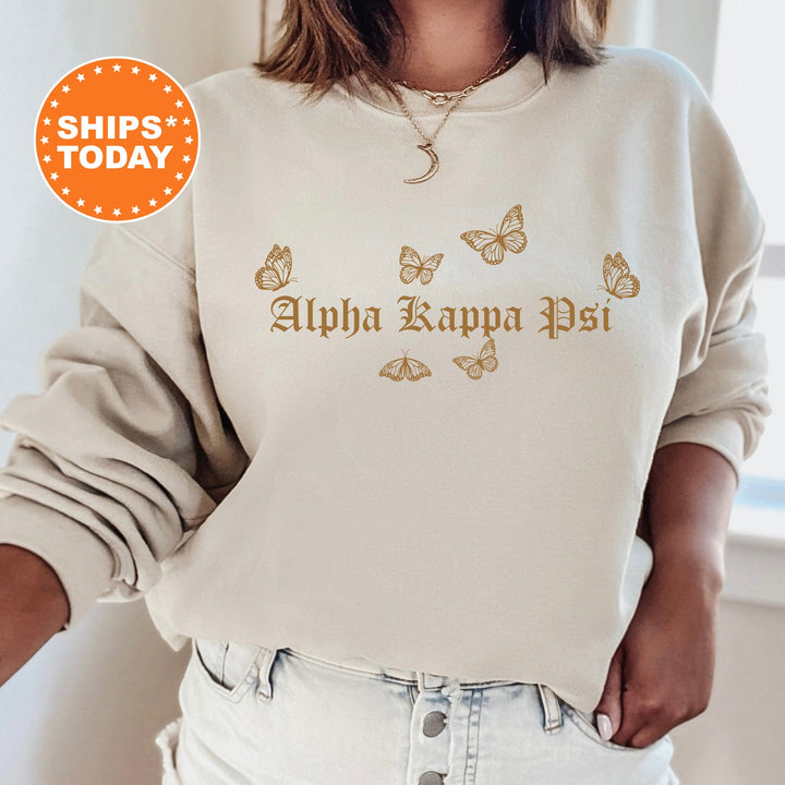 a woman wearing a sweatshirt with butterflies on it