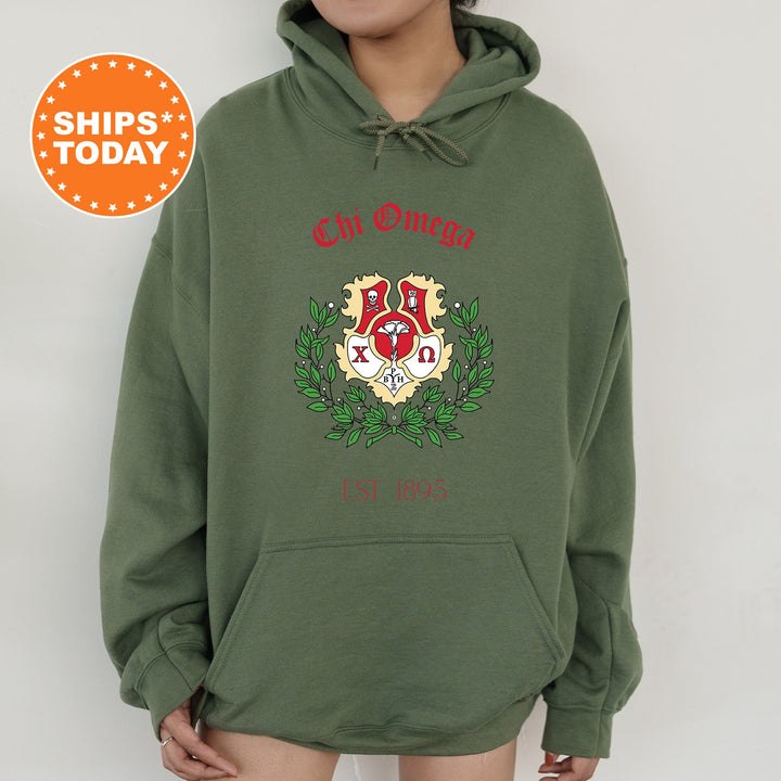 a person wearing a green hoodie with a red and white crest on it