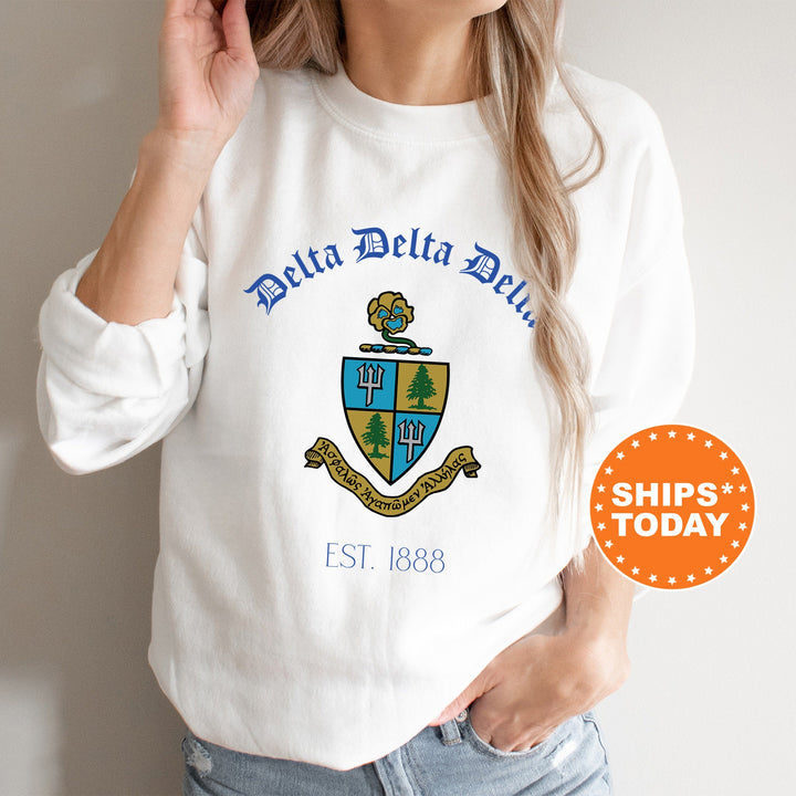 a woman wearing a white delta delta shirt