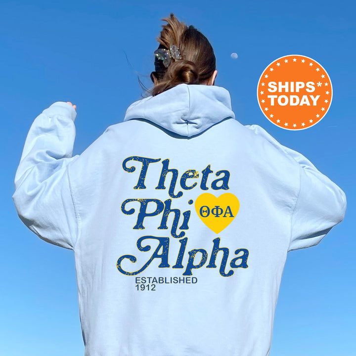 a woman with her back to the camera wearing a white hoodie