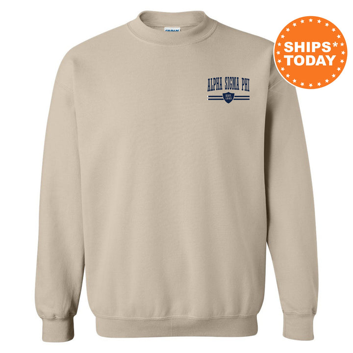 a beige sweatshirt with a blue and white logo on it