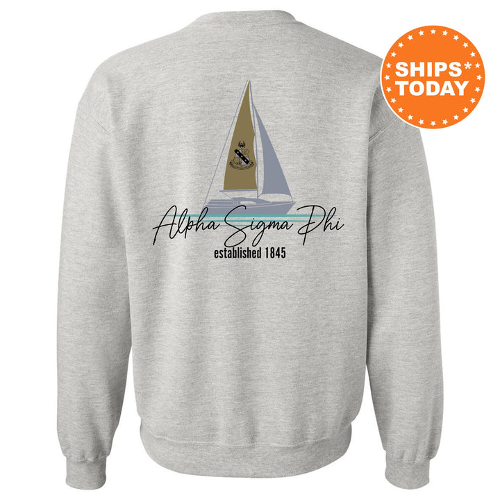 a sweatshirt with a sail boat on it