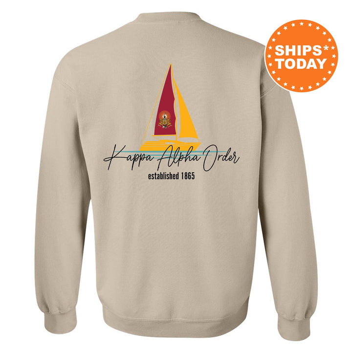 a sweatshirt with a sail boat on it