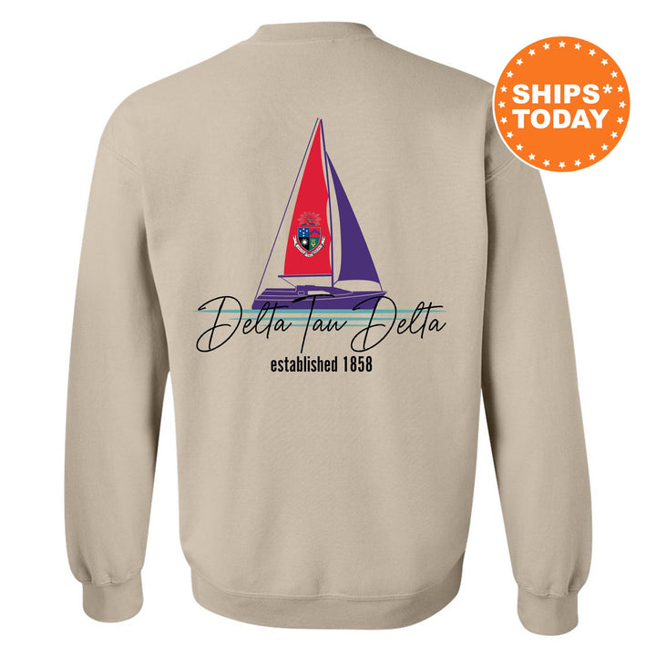 a sweatshirt with a sail boat on it