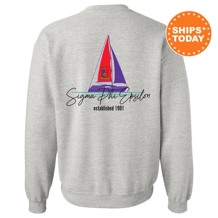 a sweatshirt with a sail boat on it