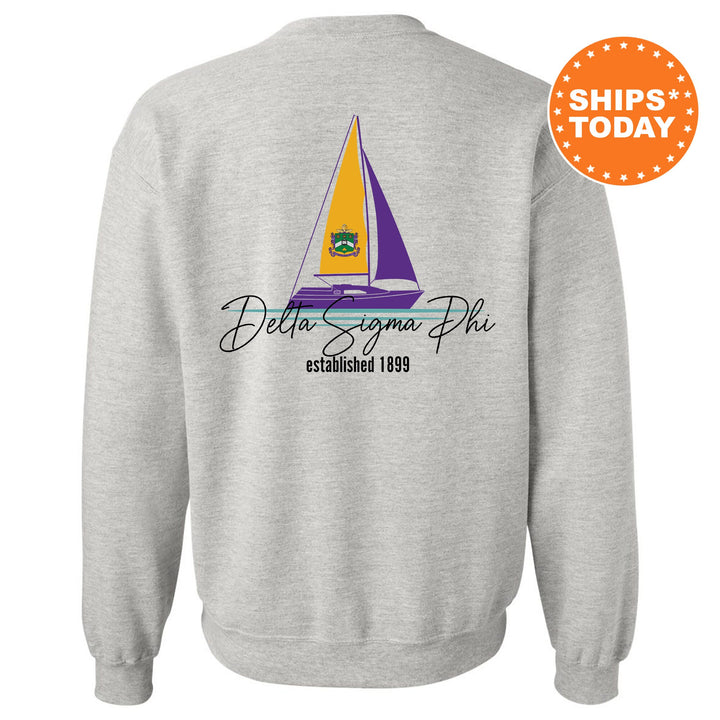 a sweatshirt with a sail boat on it