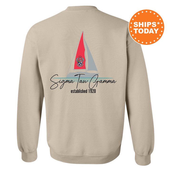 a sweatshirt with a sailboat on it