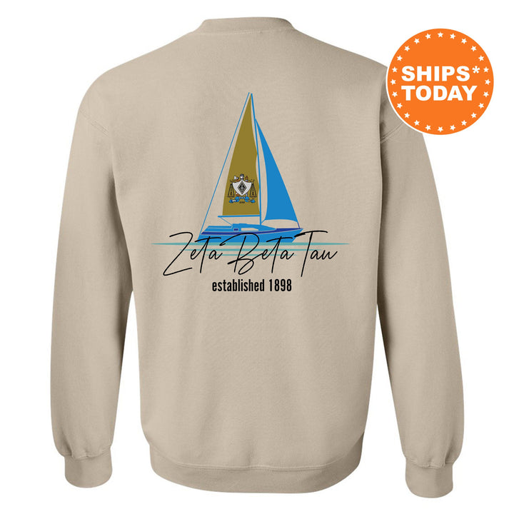 a sweatshirt with a sail boat on it
