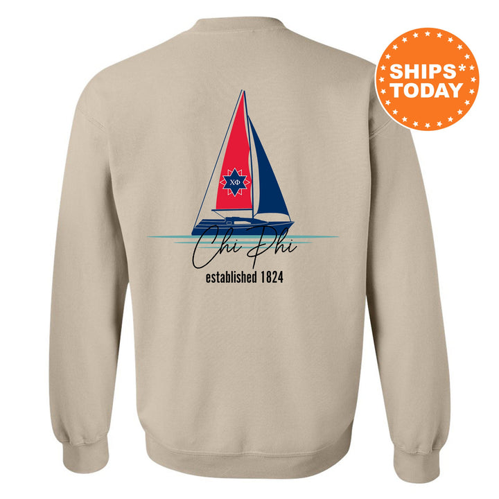 a sweatshirt with a sail boat on it