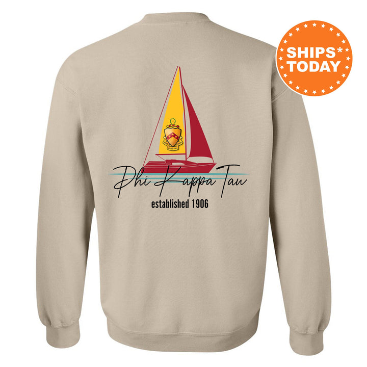 a sweatshirt with a sail boat on it