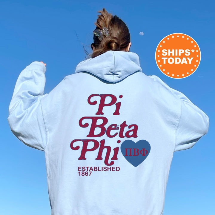 a woman with her back to the camera wearing a white hoodie