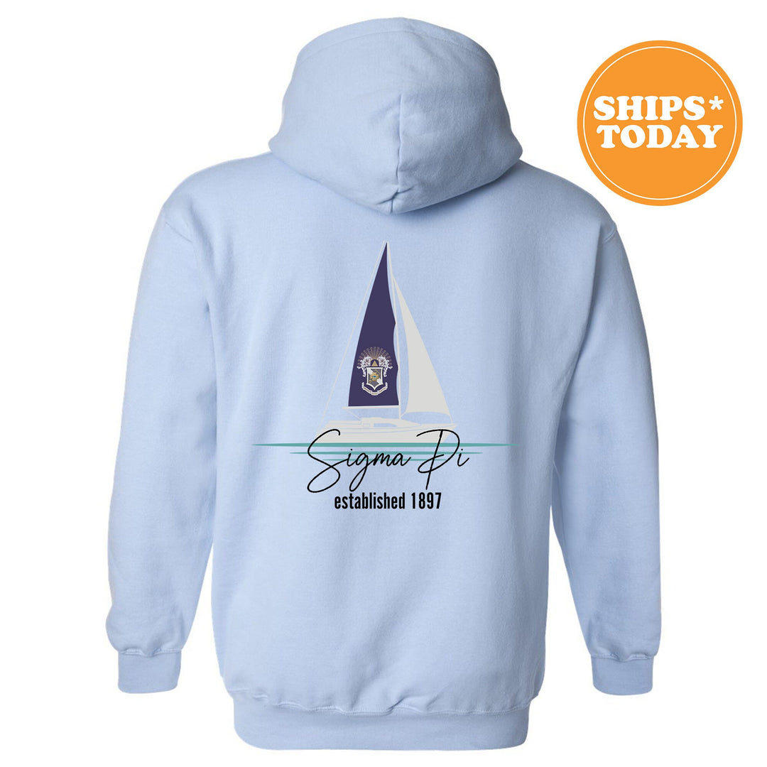 a light blue hoodie with a sailboat on it