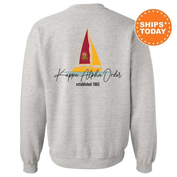 a sweatshirt with a sail boat on it