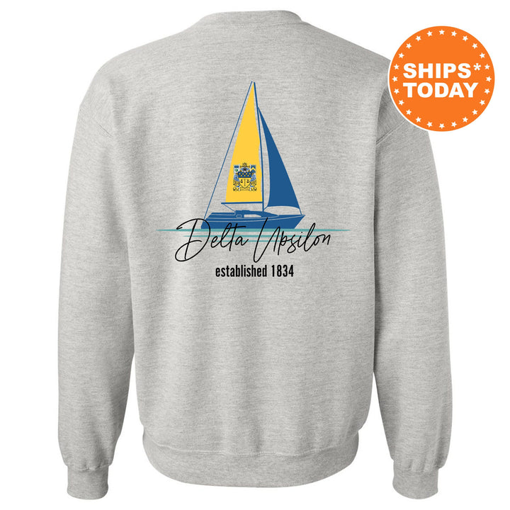 a sweatshirt with a sailboat on it