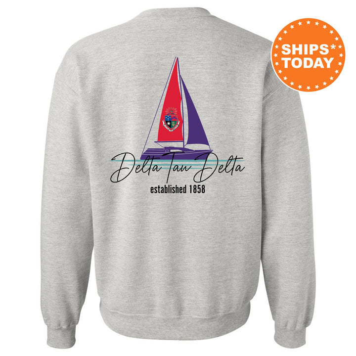 a sweatshirt with a sail boat on it